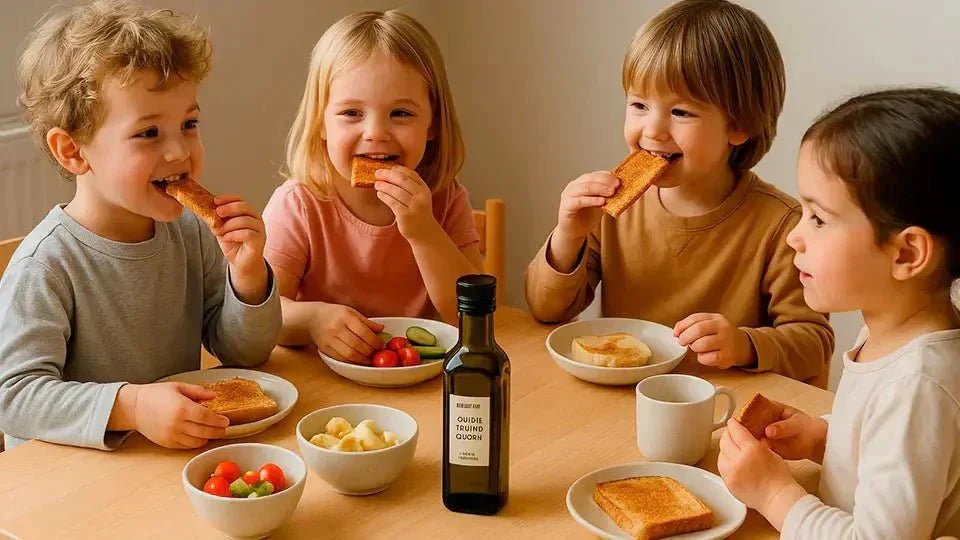 Niños desayunando con AOVE