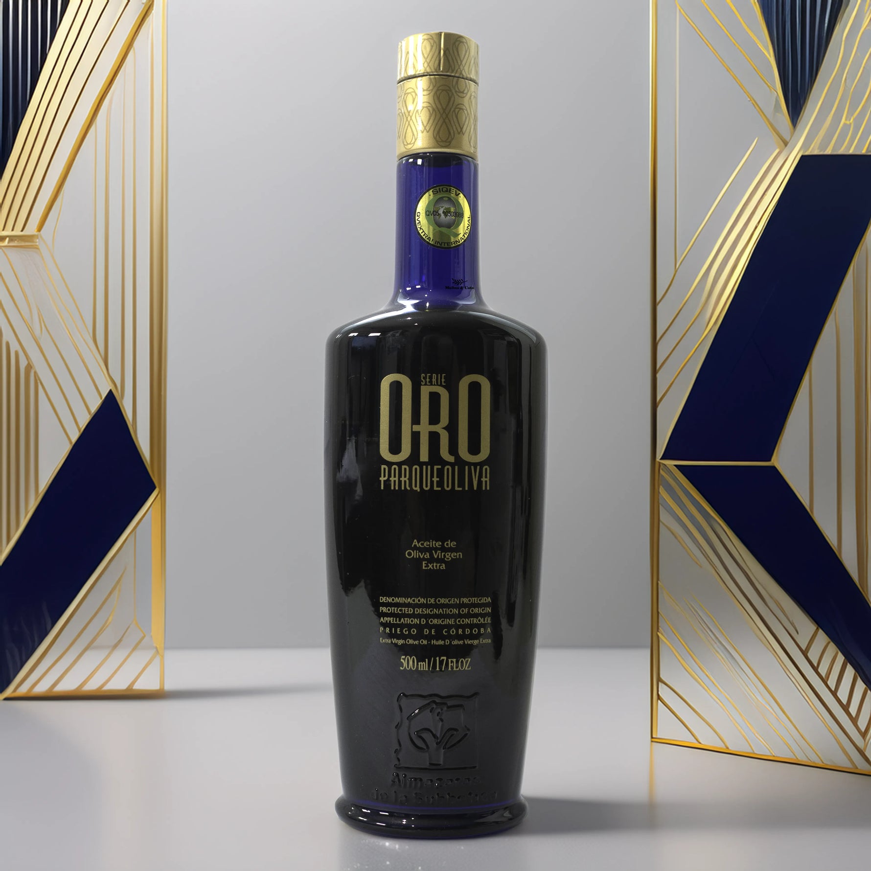 Aceite de Oliva Virgen Extra Parqueoliva Serie Oro 500ml de Almazaras de la Subbética con fondo inspirado en la botella