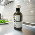 SalzySalz Empeltre Aceite de Oliva Virgen Extra 500ml en cocina profesional con ensalada